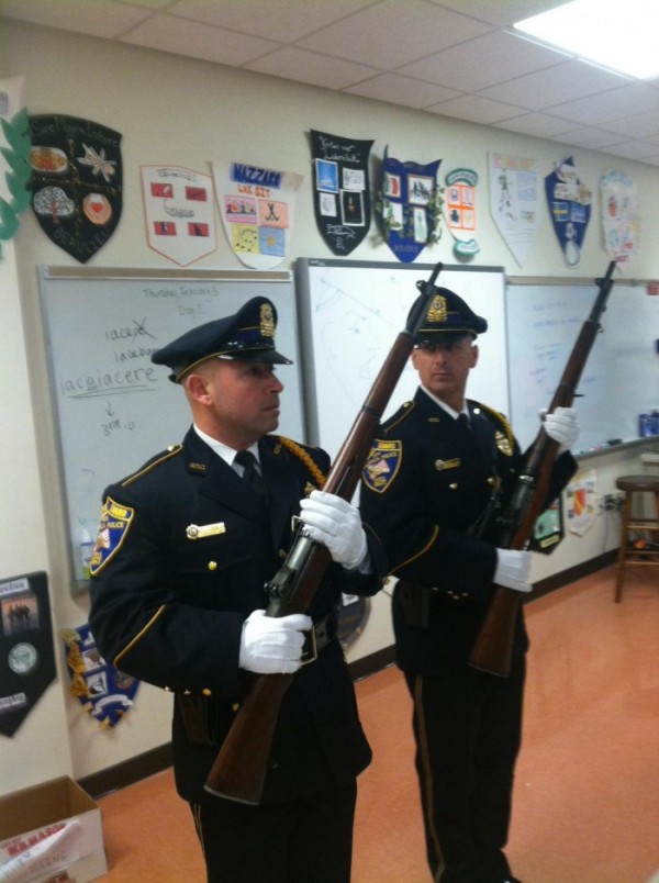 Sgt West and Sgt Gualtieri practice before Honor Guard posts at the Police Academy graduation on Thursday, February 5, 2015 at the Reading High School.